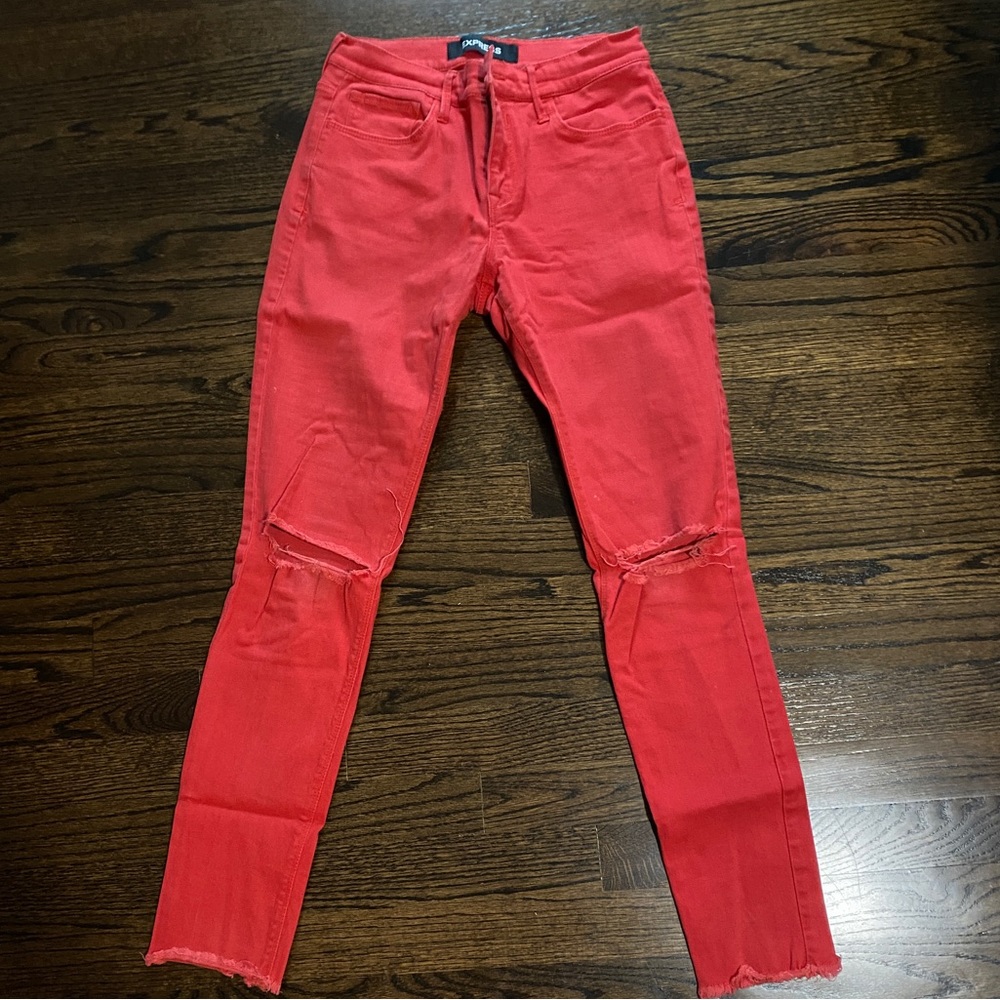 High waisted ripped raw hem red jeans